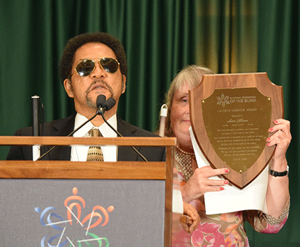 Sam Gleese accepting the Dr. Jacobus tenBroek Award