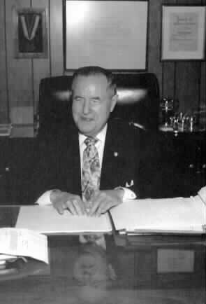Picture of Dr. Jernigan at his desk