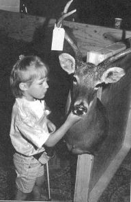 Picture of Hannah Weatherd of Montana exploring s deer.