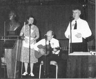 Debbie Brown and Lloyd Rasmussen singing 
Debbie's song celebrating the life of Kenneth Jernigan.  Tom Bickford accompanies them on the guitar.