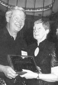 Pictured are Mike Romeo and Betty Nicely holding his Golden Keys Award