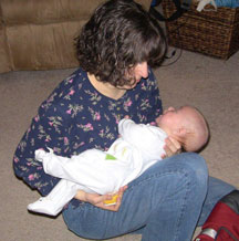 Melissa Riccobono holds her baby. 