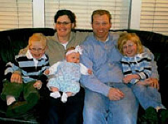 Marla and Mike Palmer and children: Adam, baby Lauren, and Megan.
