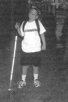 Photo of Jon Gabry with his white cane