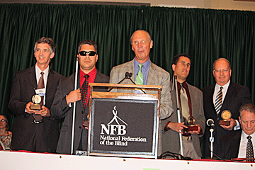 Jim Gashel presents the 2011 Jacob Bolotin awards. From left to right, the award winners are Jerry Munden, Edward Bell, Cary Supalo, and Les Stocker.