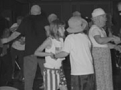 Macy and twin sister, Madison, take a turn on the dance floor ay the 2001 convention.