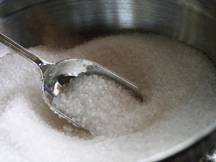 A spoonful of sugar in at sugar bowl.