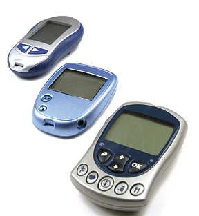 Three different glucose meters.