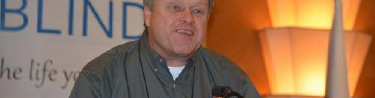 Gary Wunder addresses a group at the World Blind Union event in Orlando, Florida, in 2016.