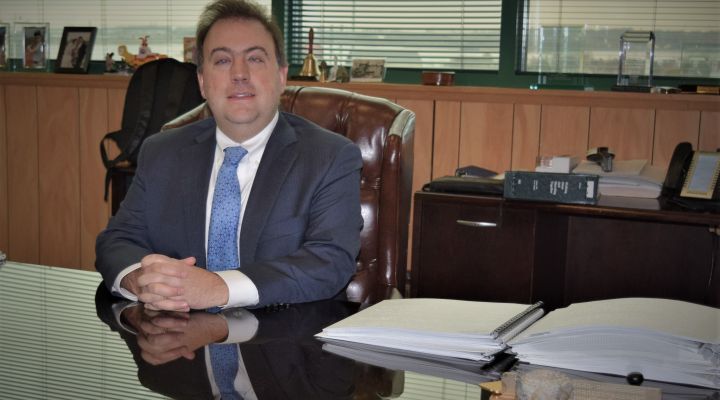 NFB President Mark A. Riccobono sits at his desk at the national headquarters. 