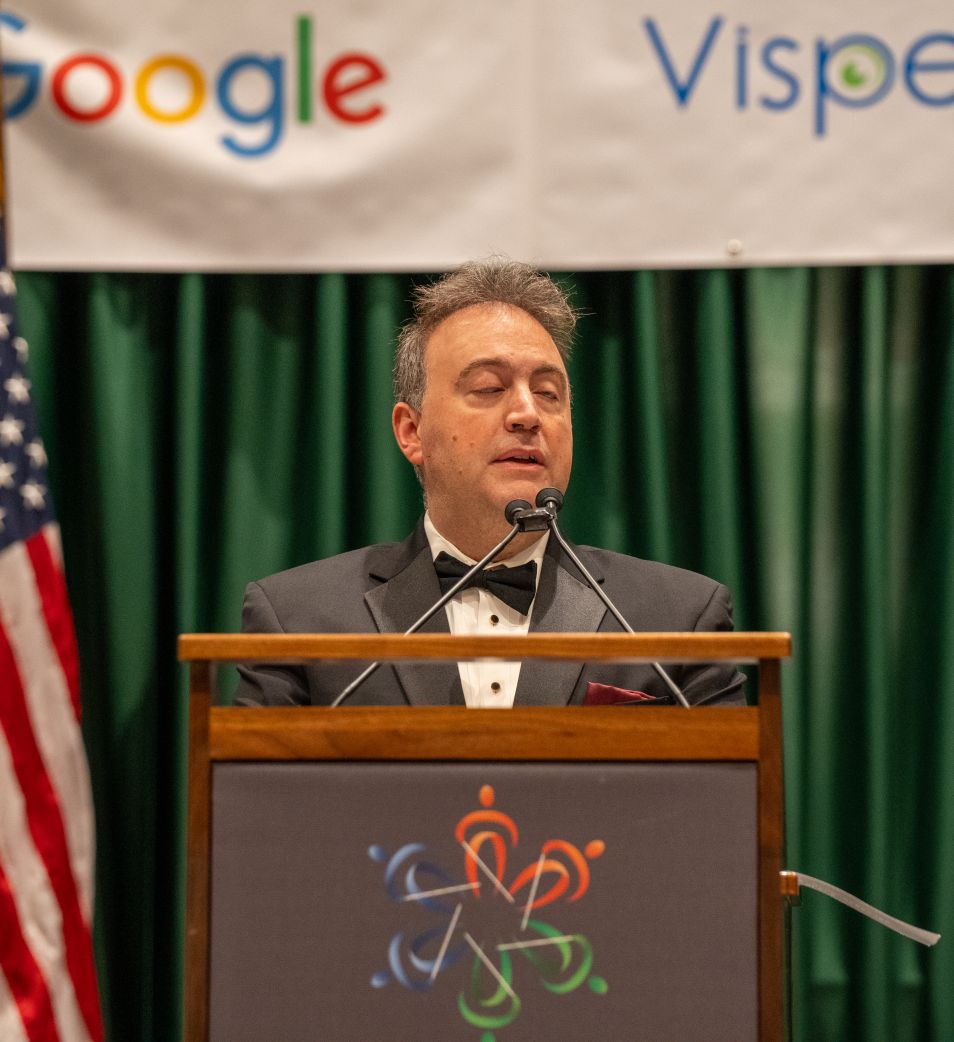 President Riccobono gives a speech at a podium.