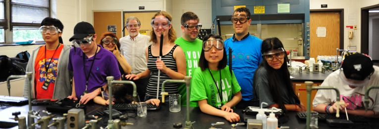 Blind students pose for a photo during a science class.