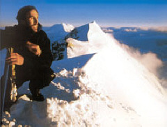 Erik Weihenmayer gazes into the distance from the top of Mt. McKinley.