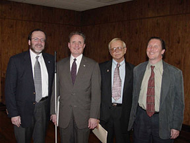 Several officials from the National Aeronautics and Space Administration (NASA) took part in the morning's activities.   Pictured left to right are Mr. Courtney Stadd, NASA chief of staff and White House Liaison; NFB President Marc Maurer; Dr. Edward Weiler, NASA Associate Administrator, Office of Space and Science; and Dr. Kent Cullers, blind radio astronomer and director of the Search for Extraterrestrial Intelligence R&D, SETI Institute.