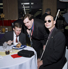 Left to right, Steve Marriott, Allen Harris, and Fred Schroeder chat at one of the many tables in the tenBroek Library