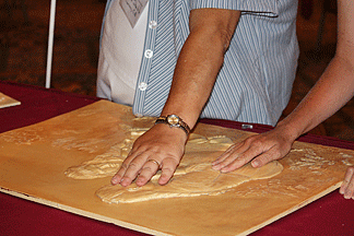 Conventioneers examine tactile art at the Artworks and Art Activities for All Ages.