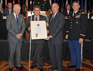 Pictured left to right are John R. Campbell, deputy assistant secretary of defense, wounded warrior care and transition policy; Nathanael Wales, award winner; Thomas R. Lamont, assistant secretary of the Army, Manpower and Reserve Affairs, Department of the Army; and John Boule, New York district commander.