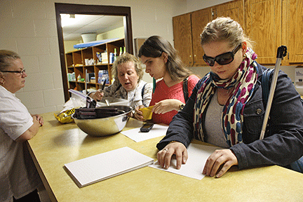 Natalie Shaheen reading Braille