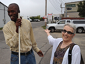 Patricia Estes and NFB of Georgia President Garrick Scott outside Becky�s Diner