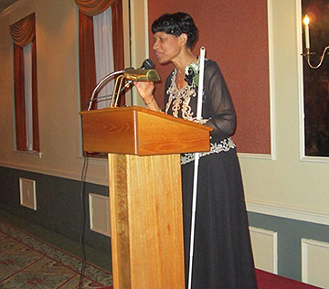 Denise Brown making remarks after she received her award