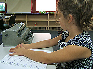 Mackenzie reading a Seedlings book