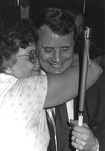 June Maurer hugs her son at the 1998 National Convention.