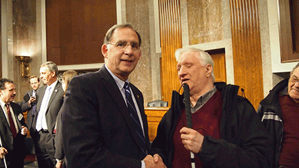Senator John Boozman shakes hands with a Federationist from his home state of Arkansas.