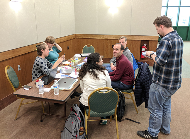 Team B discusses methods to give feedback on pulse, speed, and other information to blind athletes.