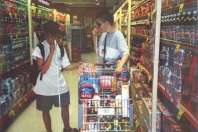 These two teen boys are learning how to grocery shop independently - a task that will be much easier if, like Serena, they had many preschool experiences shopping with mom.