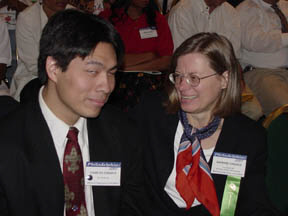 Barbara Cheadle and son, Chaz, enjoy a break during an NFB Convention.
