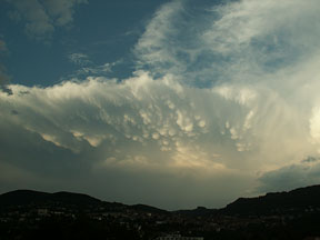 Clouds gather, warning of a storm ahead. [Wikipedia Commons]