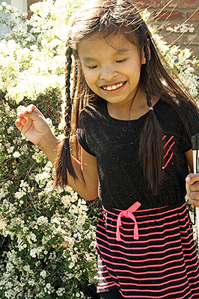 Jeni in her family's back yard