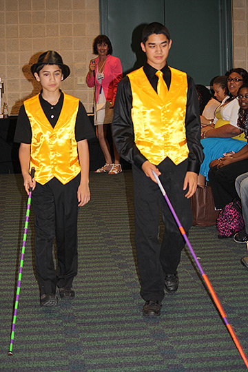 Ethan Solano and his brother, Roman, at the NOPBC Fashion Show