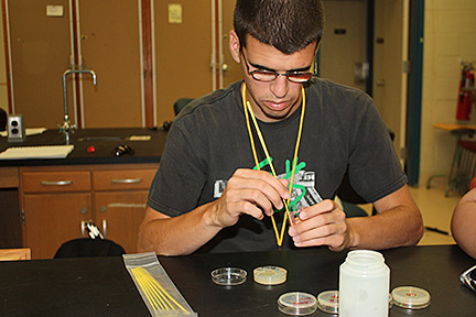 Mark Colasurdo conducts a laboratory experiment