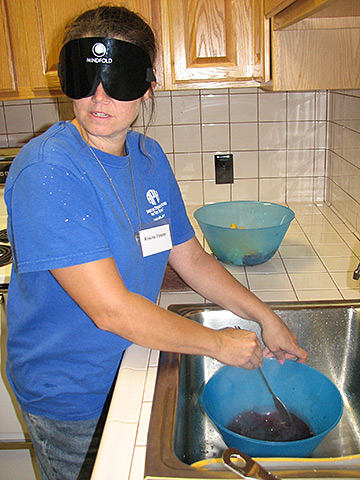 Rosina Foster learns blindness skills under sleepshades.