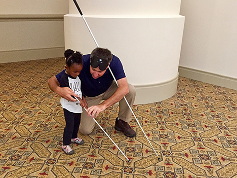 Lizzy receives a cane lesson.